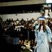 A graduate uses crutches to get across the stage during Skyline High School Commencement on Monday, June 10. Daniel Brenner I AnnArbor.com